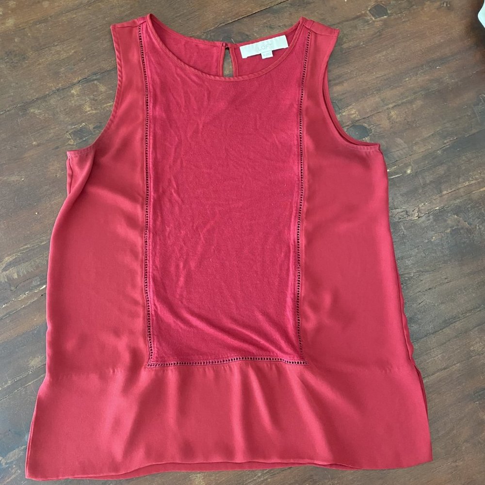 red sleeveless blouse